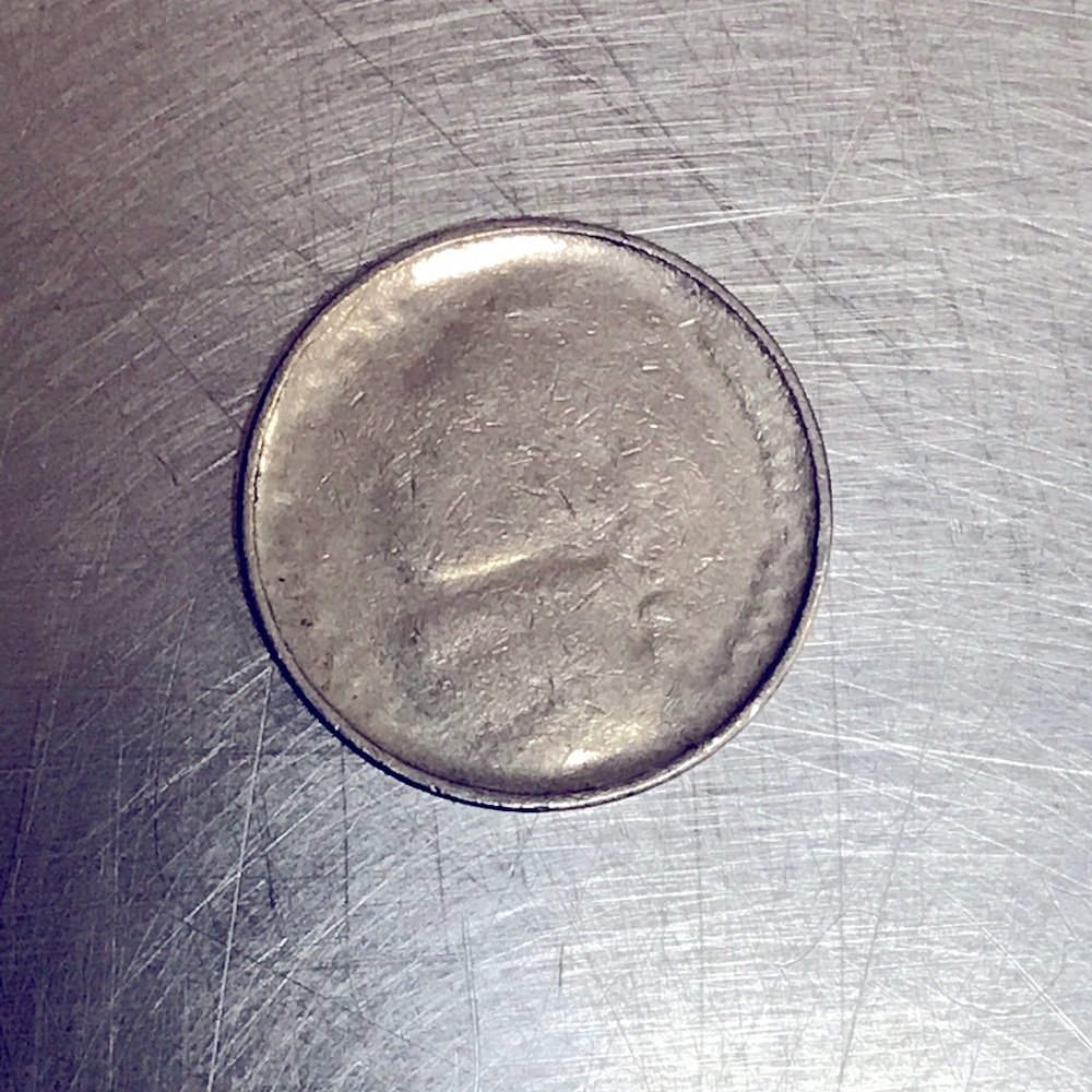 Errors all over this Jefferson nickel. It’s an big